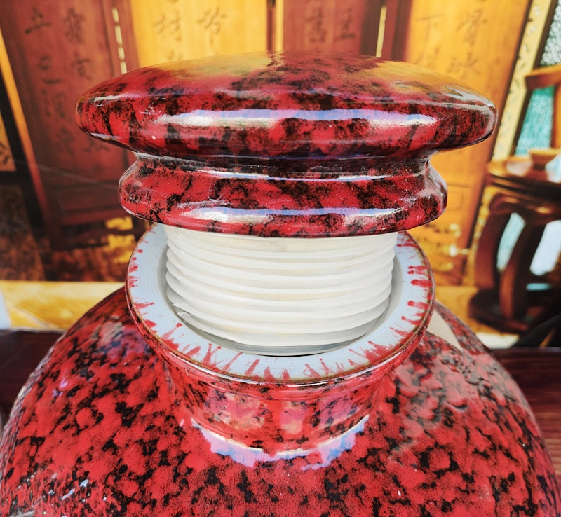 50斤红色花釉雕刻荷花陶瓷酒坛